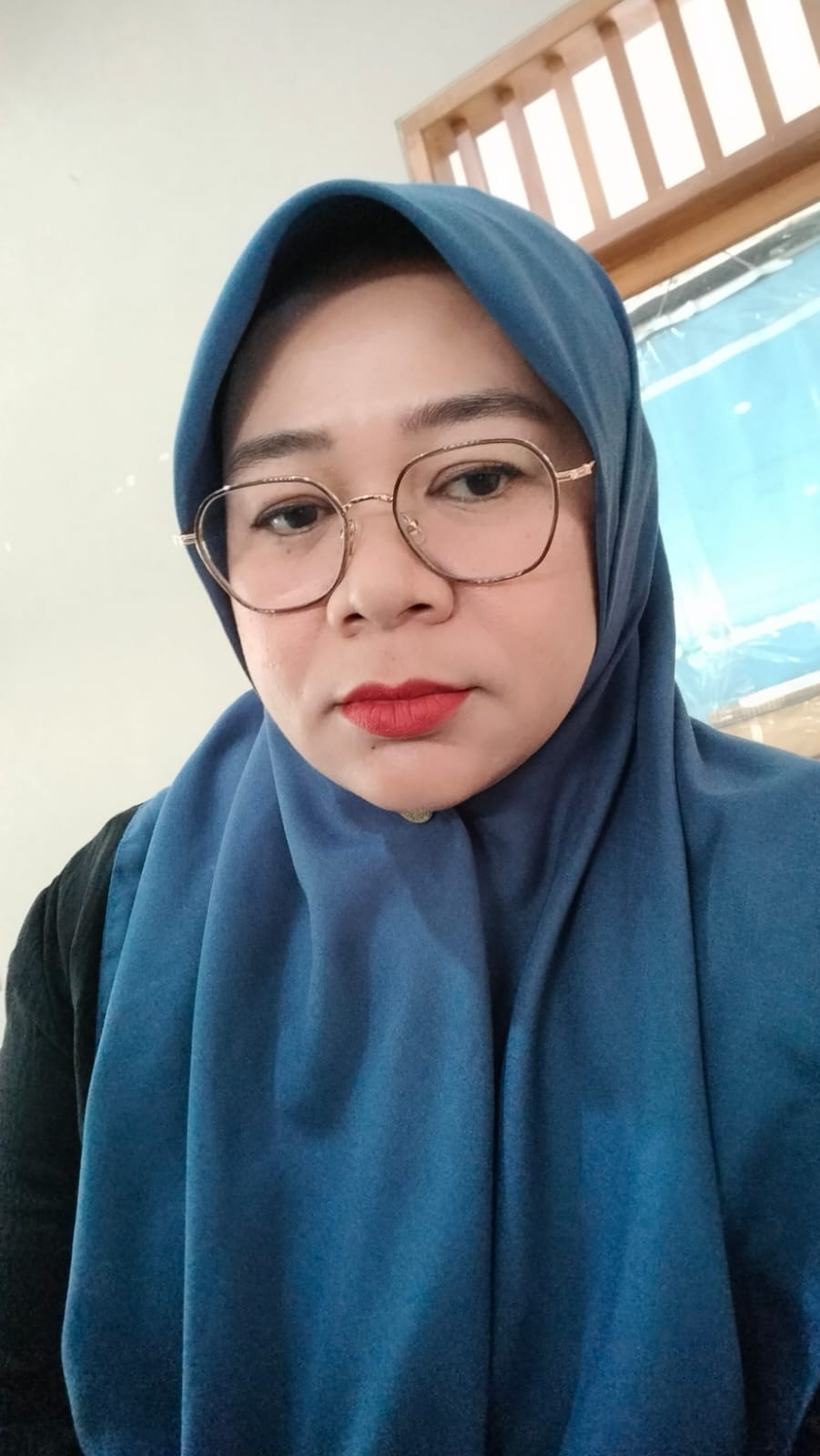 Yulia Rahmi,S.Ag,